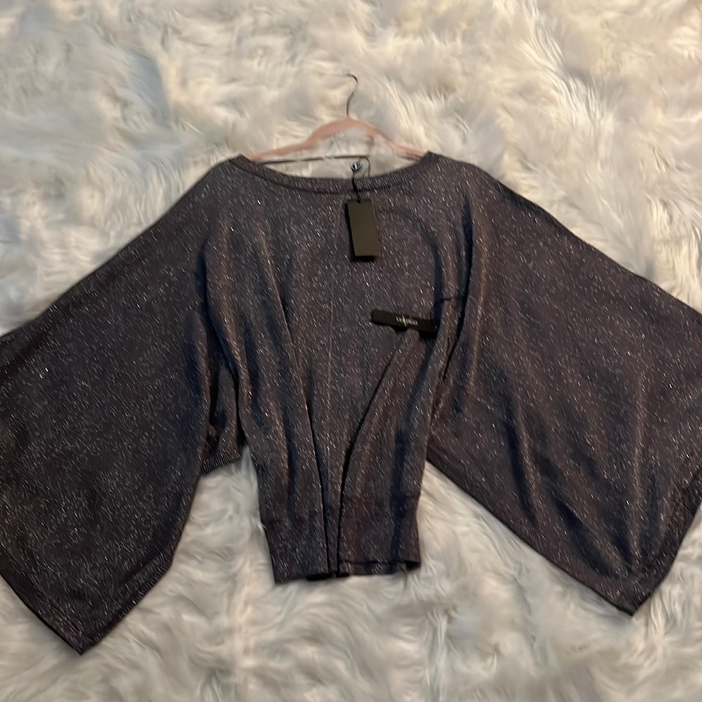Vertigo, Holiday sweater/blouse.